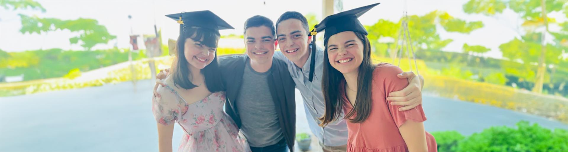 All four Wilcox siblings celebrate going to CU